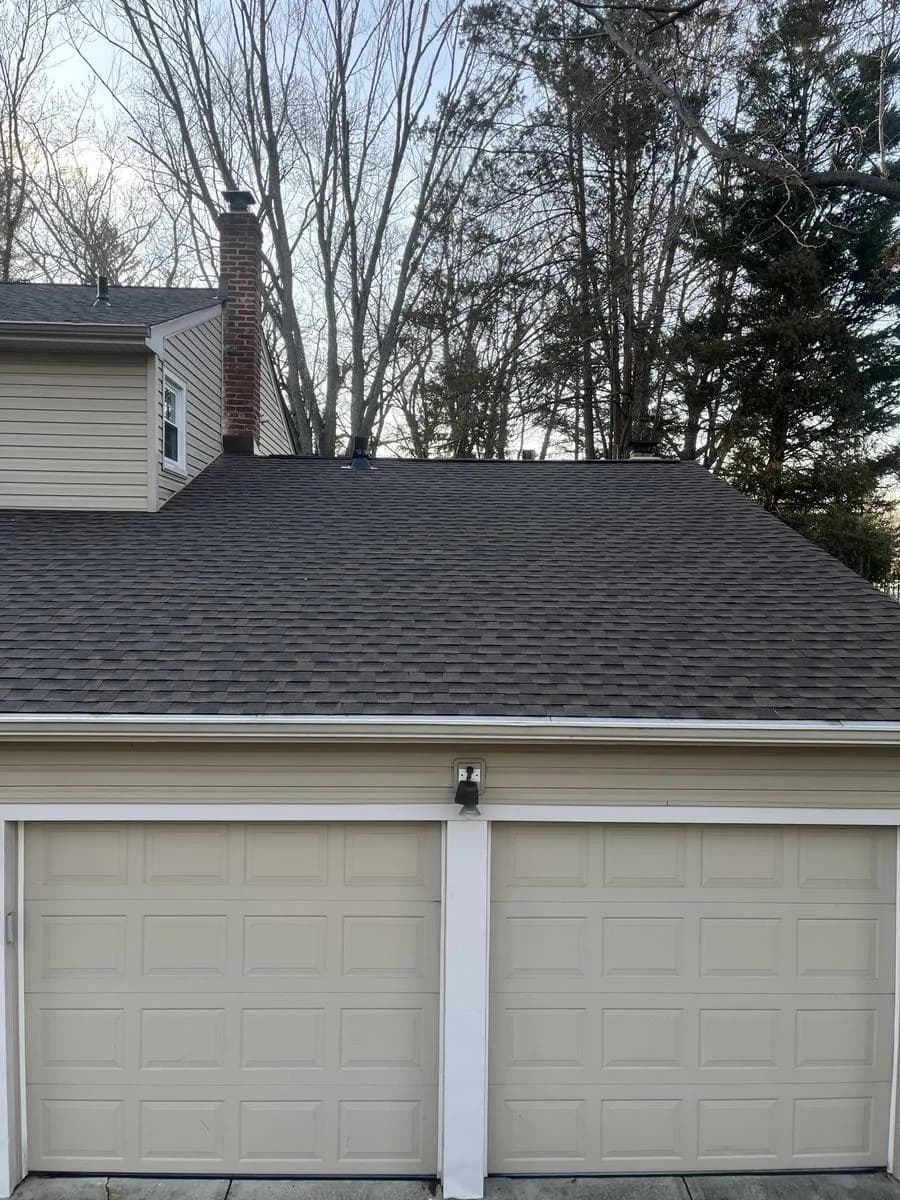 Garage roof view with chimney and new GAF Timberline HDZ shingles — Cherry Hill Township