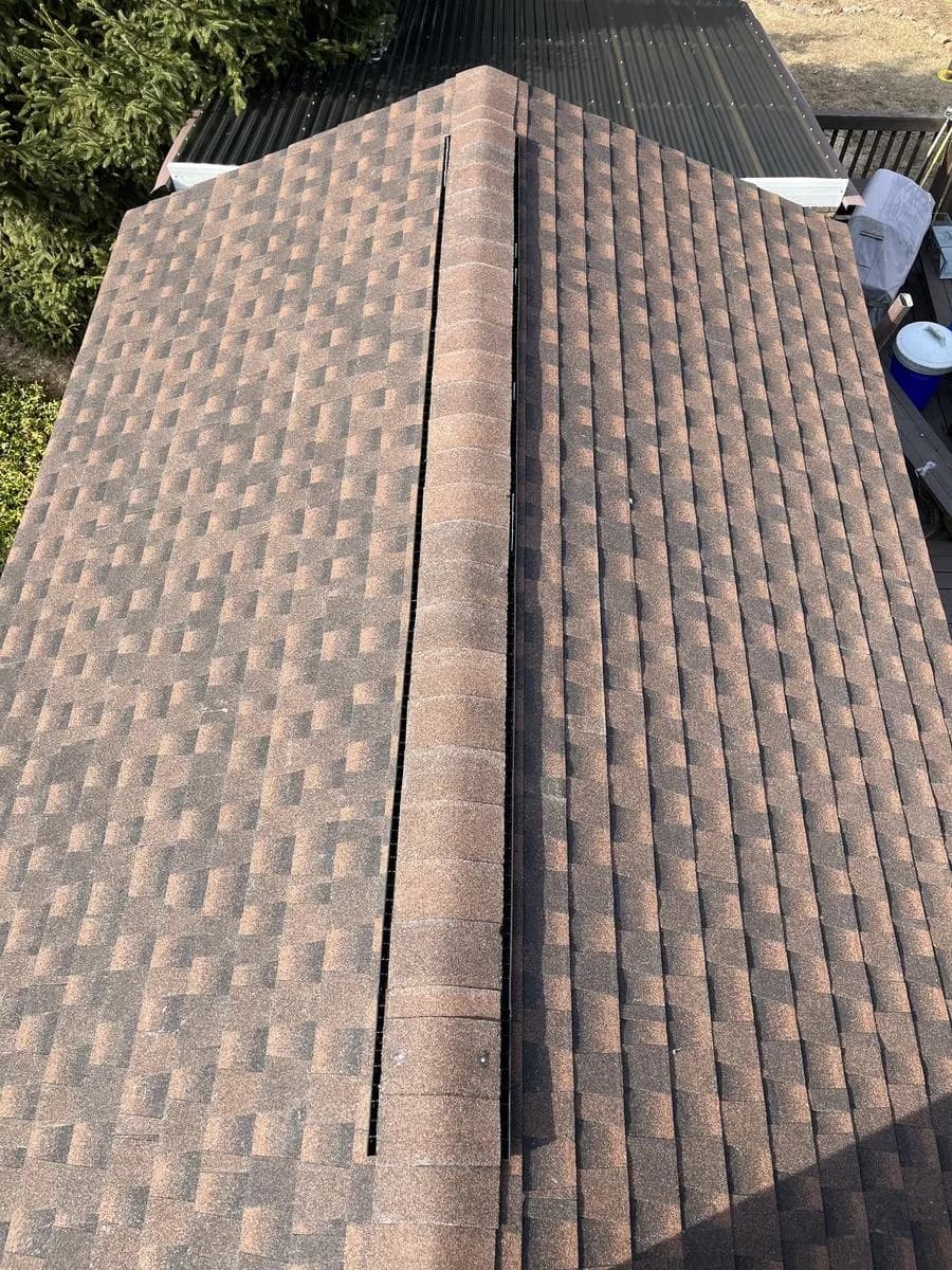 Detail of new GAF Timberline HDZ Hickory shingles with ridge cap — Rockaway, NJ