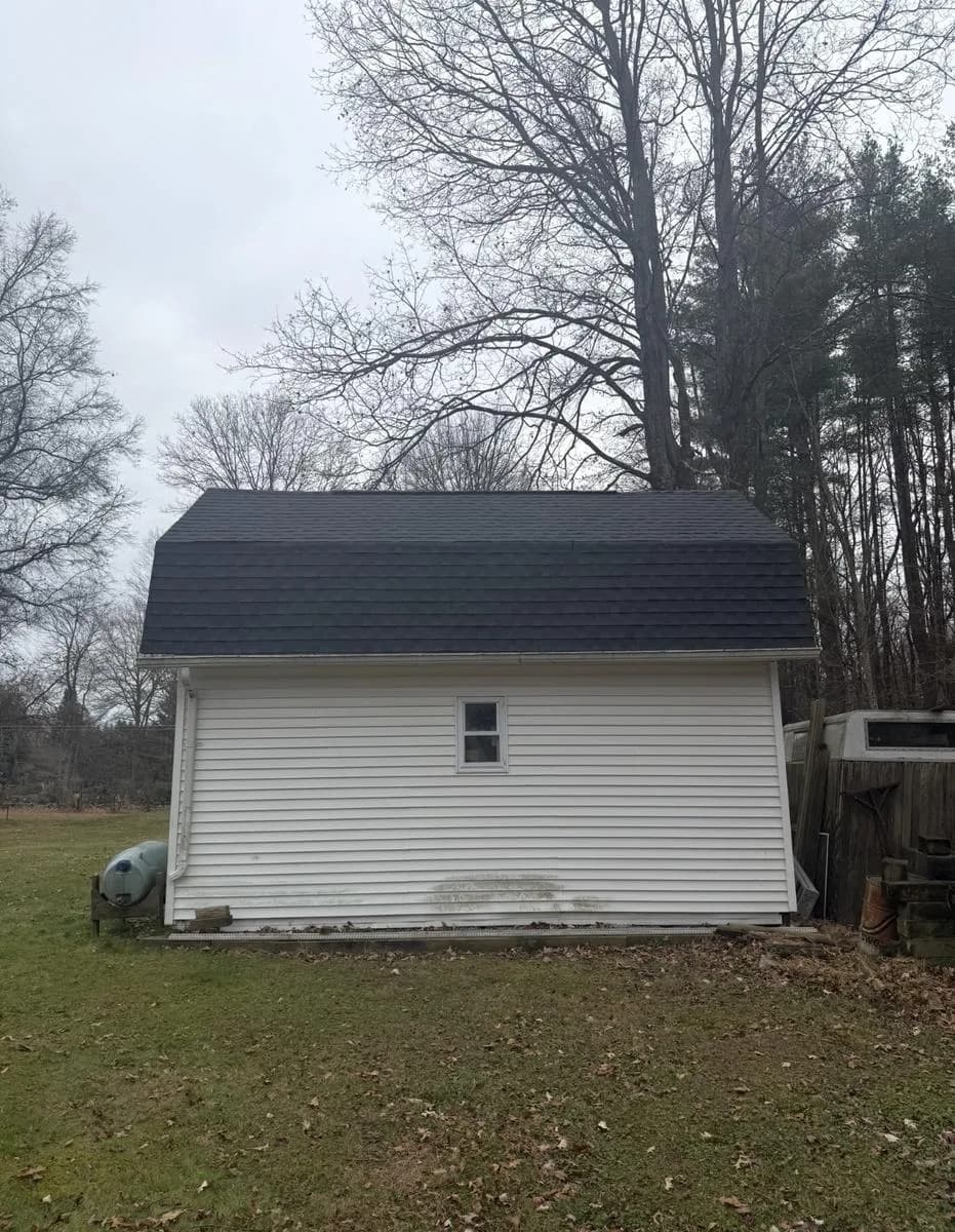 Side view of detached shed with completed mansard roof — Wallkill, NY