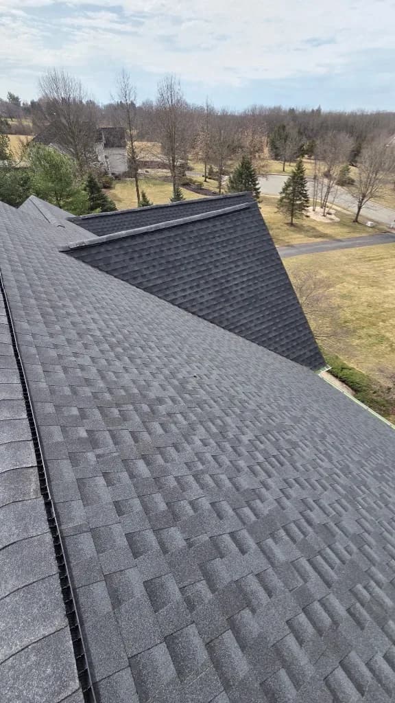 New dark grey shingle roof installation — NJ